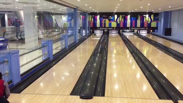 Adorable child Done Clever shot At Bowling!