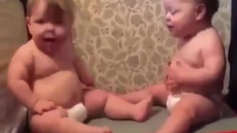 Funny kids enjoying the fun of a vibrator