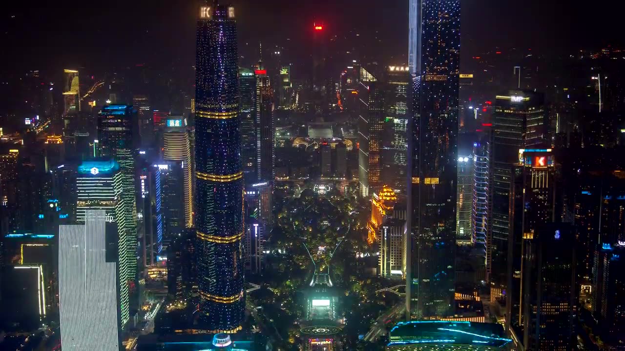 Futuristic buildings flashing in the night