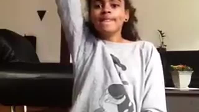 Donald duck shirt green fidget spinner falls on girl's face