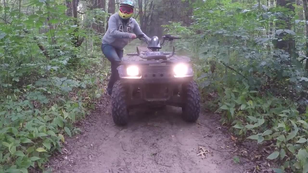 Guys spits on helmet while he has it on