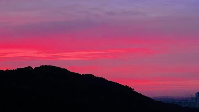 Korea city Sunset with buildings and mountains