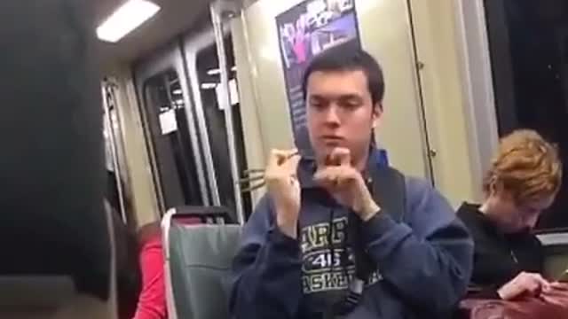 Kid in subway car flicks green bean