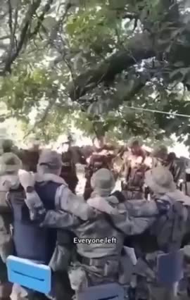 Russian soldiers support each other before going on a combat mission