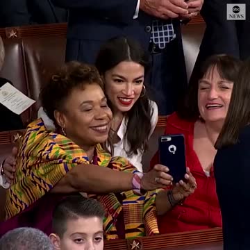 Alexandria Ocasio-Cortez takes selfies