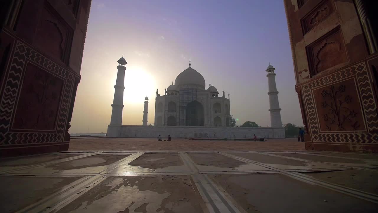 Short tour Approaching the Taj Mahal through an arched corridor Beautiful view