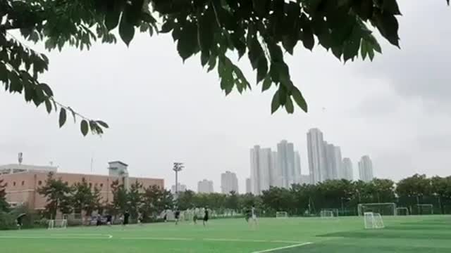 playing soccer on a rainy day in south korea