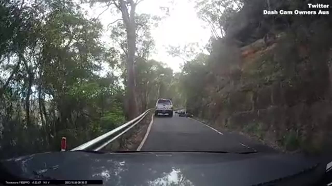 Shocking moment a motorcyclist is flung through the air