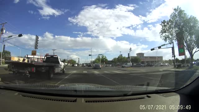 Rogue Tire Bounces Over Car