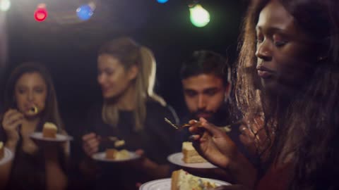 Group of Friends Eat Birthday Cake