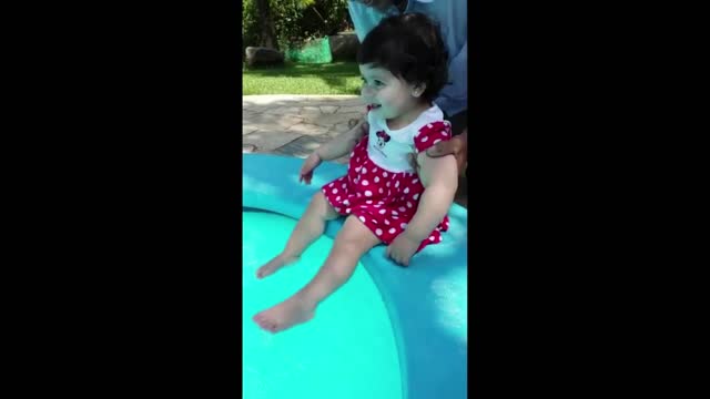 playing in the pool