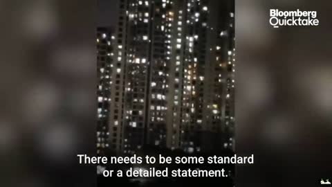 Shanghai residents called out from their apartments after days of #Covid19 lockdown.