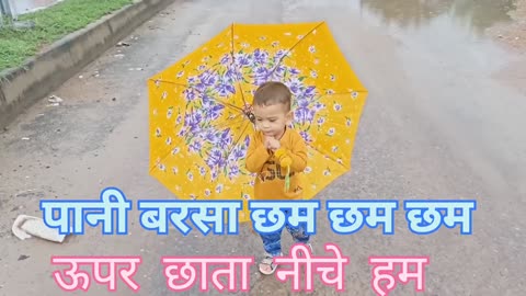 Aaryaveer Panwar's "Daddy's Laddu" on YouTube features a lovely baby masti in the rain.