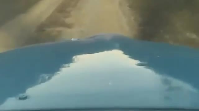 Cessna 182 Skylane ll landing on a mining track in the Amazon