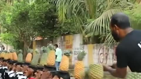 Most pineapples on head cut in half in 30 secs.: 75 by K.V Saidalavi