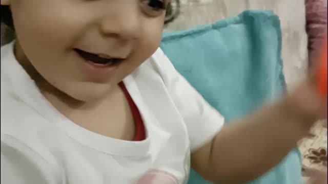 A child tricks me into a game of hand
