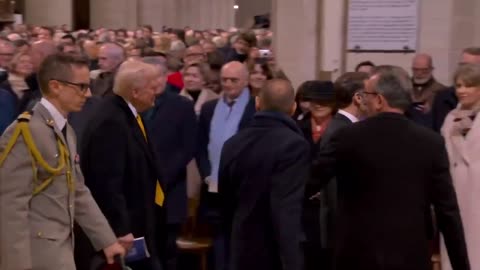 President Trump looked like a boss as he departed Notre Dame with French President Macron