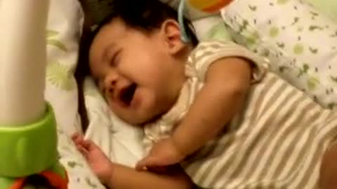 What a good dream baby is even laughing.kkk