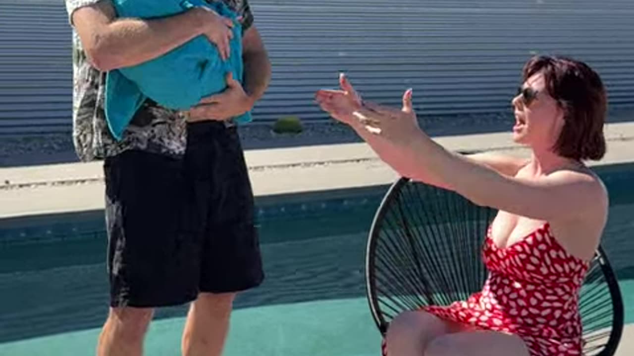 He threw the baby in the pool! 😱