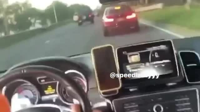Supercar crashes at roadside, live video