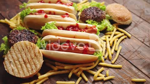 Hot dogs hamburgers and french fries Composition of fast food snacks