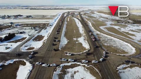 A huge convoy of cars and trucks are protesting in Canada.