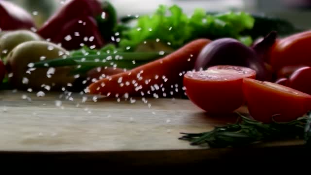 Sprinkle Of Rock Salt On Fresh Vegetables