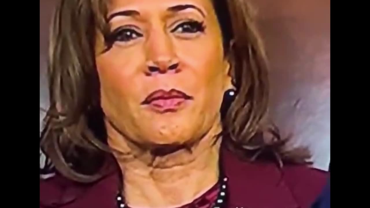 Is there a FAKE Kamala Harris. Looks like she’s wearing a mask. Watch & Look at her neck. Weird