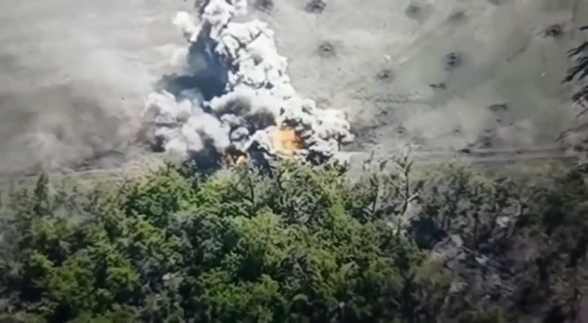 Two Russian BMP's drive headlong into a minefield