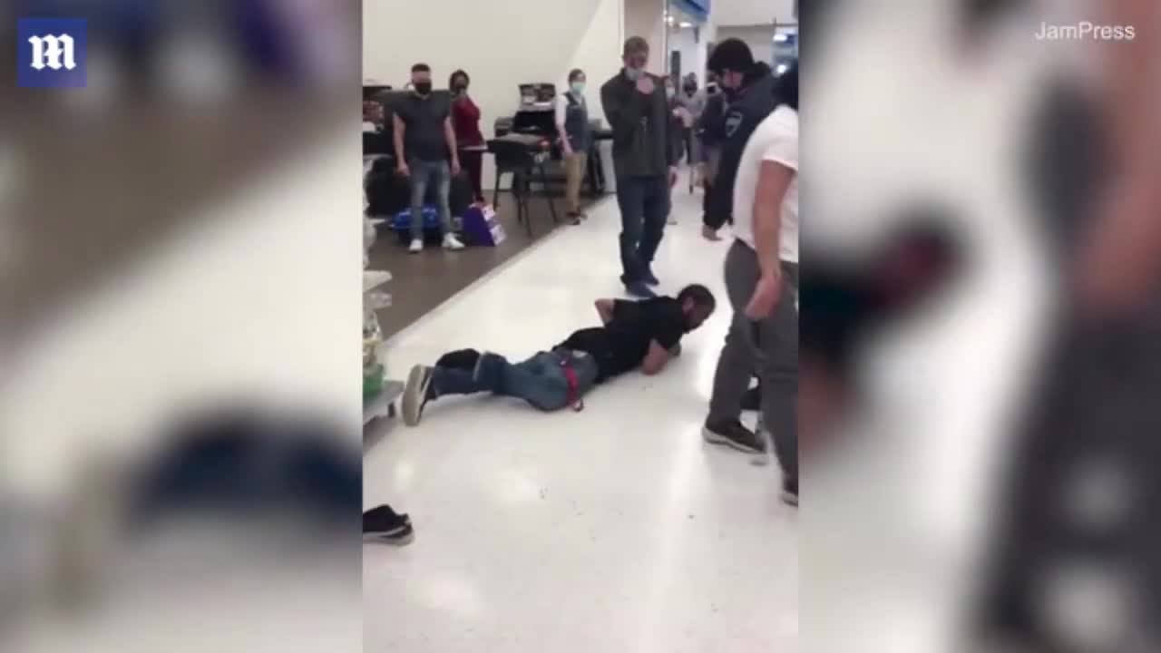 Drunken Walmart 'shoplifter' gets knocked down by customer