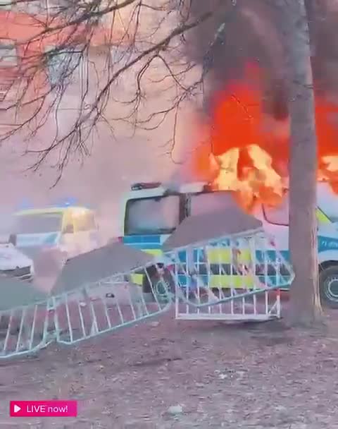 Sweden: Police vehicle set on fire by Muslim rioters.