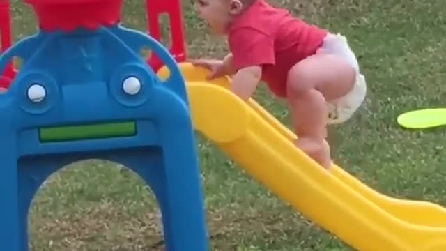 Funny babies playing in park