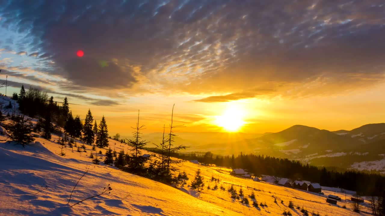 Nightfall over a blanketed winter mountain