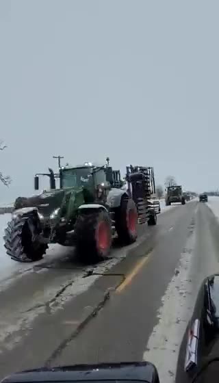 Farmers taking turns and disrupting traffic by rolling slowly near the Sarnia border.