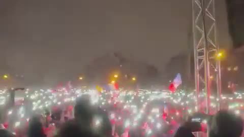 Chants of 'Liberté' as Paris is lit up tonight 08.01.2022