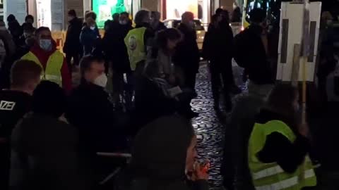 German police start measuring distances between people with folding rulers in public