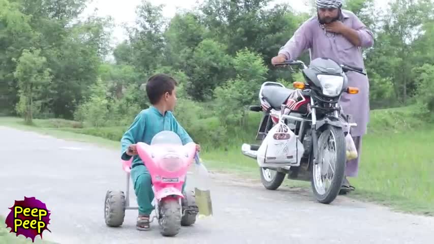 Good child helping motorcycle man petrol tank