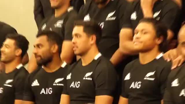 NZ All Blacks sing during photo shoot.