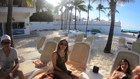 4. 2 Girls with a Guy on the Beach - The Attractive Man