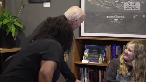 Biden Whispers To A Young Girl....