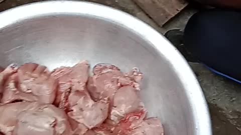 Chickens cutting for occasion