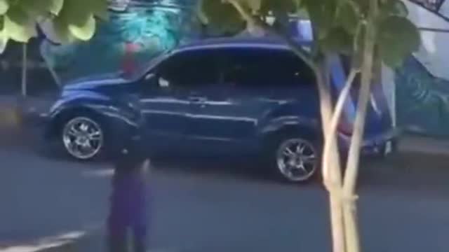 Crazy lady throwing bottles on cars