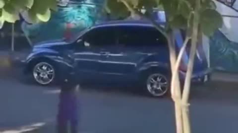 Crazy lady throwing bottles on cars