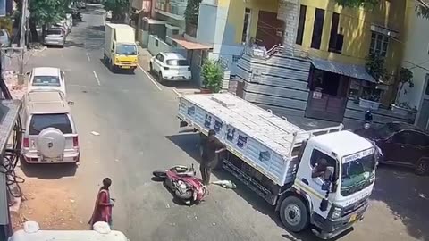 Video shows a bull ramming into a man riding motorbike on a busy road near Bengaluru in India