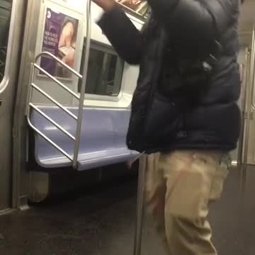 Guy dancing rap battle hip hop subway beats headphones