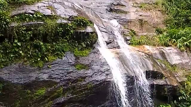 THIS WATERFALL IN THE FOREST IS THE MOST BEAUTIFUL THING WE CAN ADIMIRATE