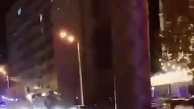 Long line of ambulances carrying wounded soldiers.