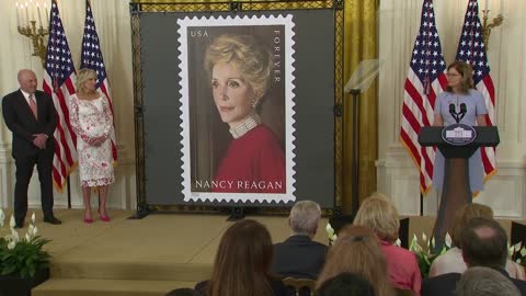 First Lady Dr. Jill Biden unveils a new US Postal Service stamp honoring former First Lady Nancy Reagan