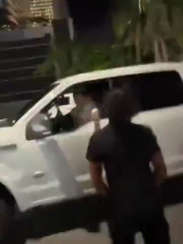Driver rams car after being struck in the face during road rage altercation in Miami.mp4