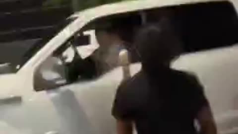 Driver rams car after being struck in the face during road rage altercation in Miami.mp4